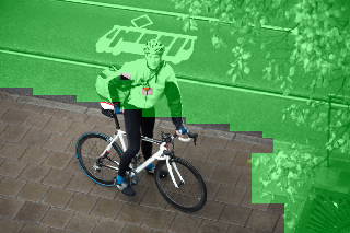 Camera view with a motion detection mask blocking the road and tree areas